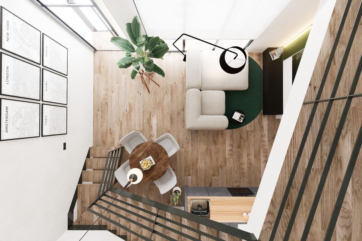 Vogelperspectief op de woonkamer waarbij de indeling van een gelijkvloers appartement in Alicante te zien is.