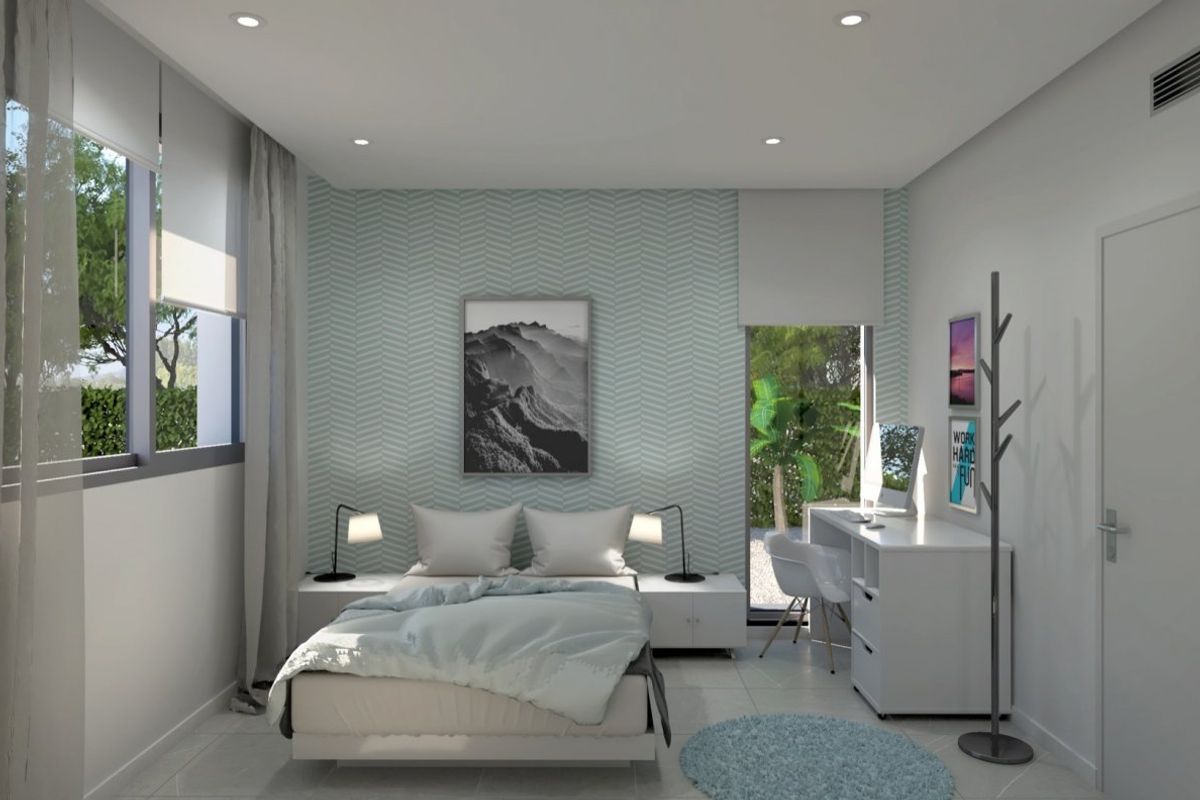 Serene bedroom in Baños y Mendigo villa, decorated in soothing colors, with natural light.