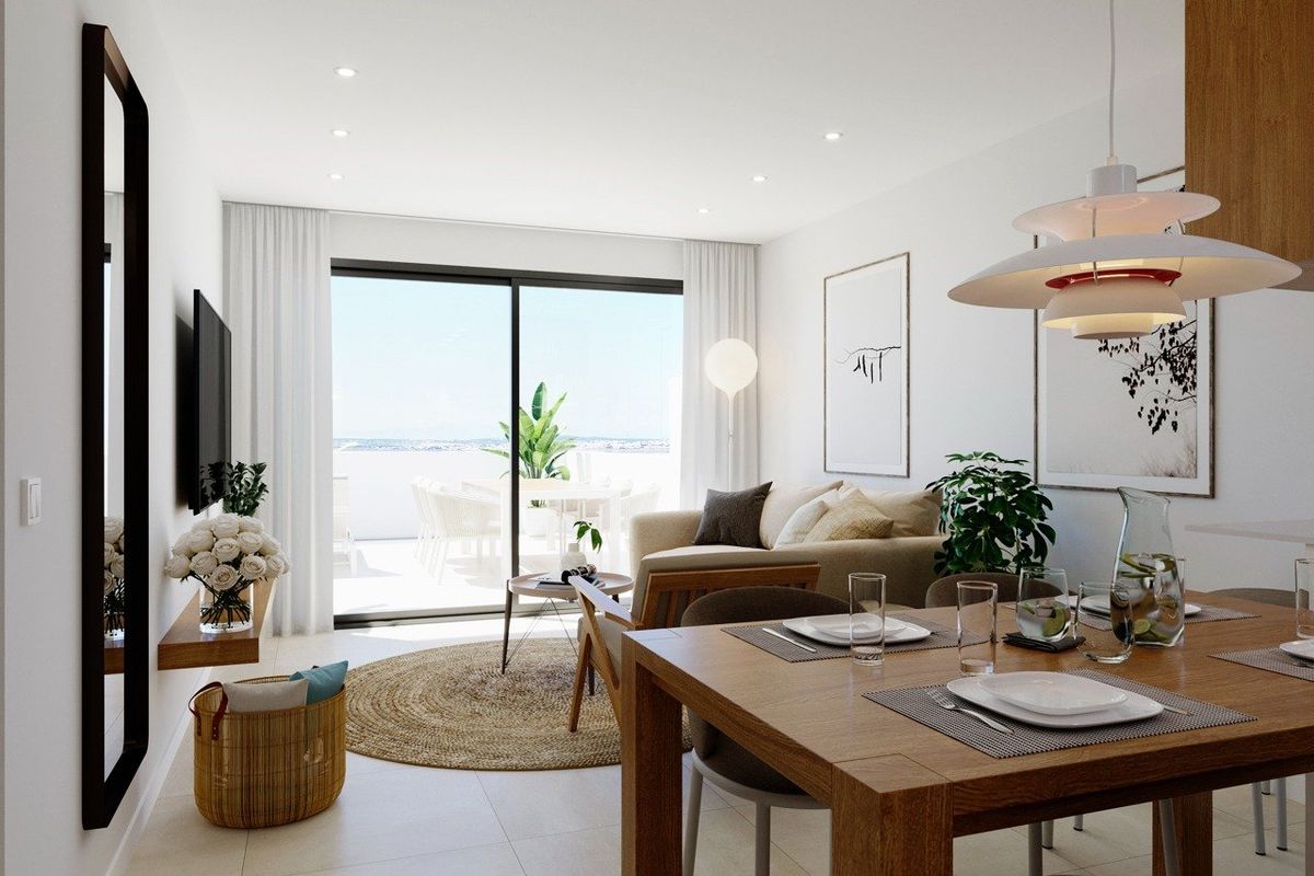 Moderne eet- en woonruimte in een 2-slaapkamer appartement met terras in Torrevieja, Costa Blanca Zuid.