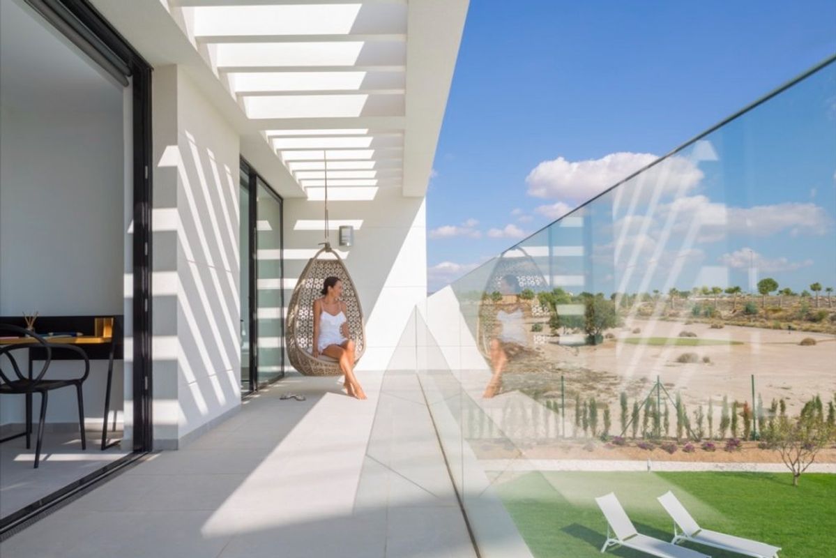 Spacious terrace with a hanging chair and stunning views in Baños y Mendigo, Costa Calida villa.