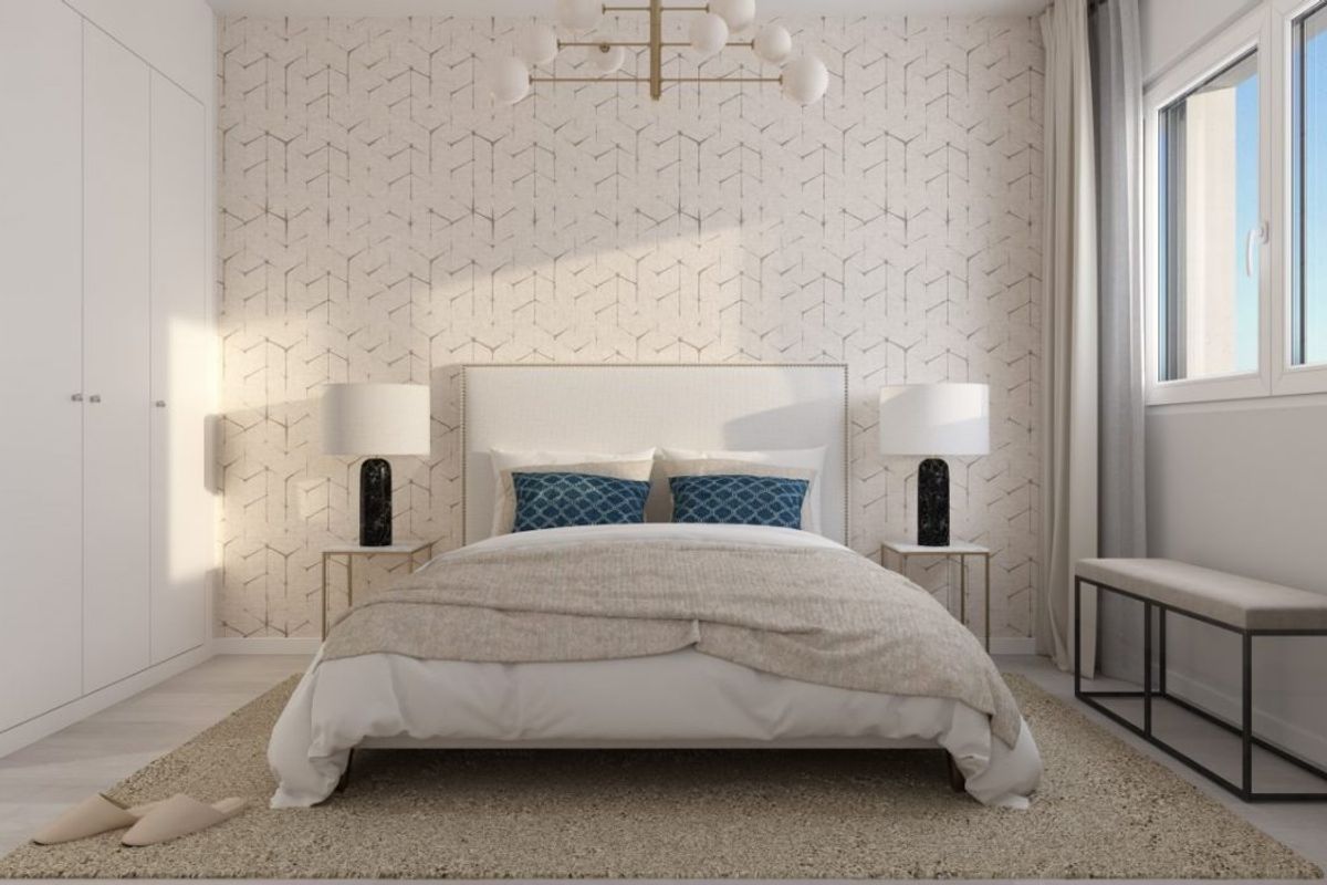 Heldere slaapkamer met een comfortabel bed en natuurlijk licht in het 2-slaapkamer appartement in Vélez Málaga.