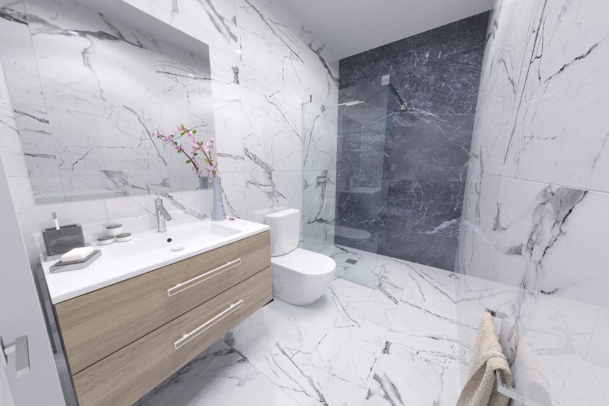 Strak badkamerontwerp in een 3-slaapkamer villa, Ciudad Quesada, met marmeren details en moderne armaturen.