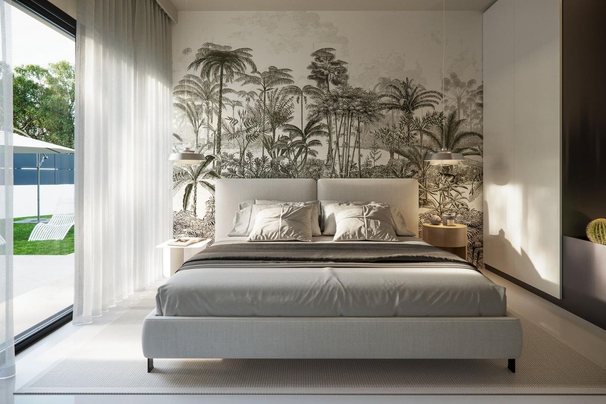 Elegante slaapkamer in de villa, met een natuur geïnspireerd ontwerp en uitzicht op de tuin in San Miguel de Salinas.