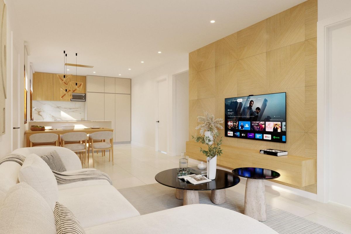 Gezellige woonkamer met modern interieur en tv in een 2-slaapkamer townhouse in Orihuela, Costa Blanca.