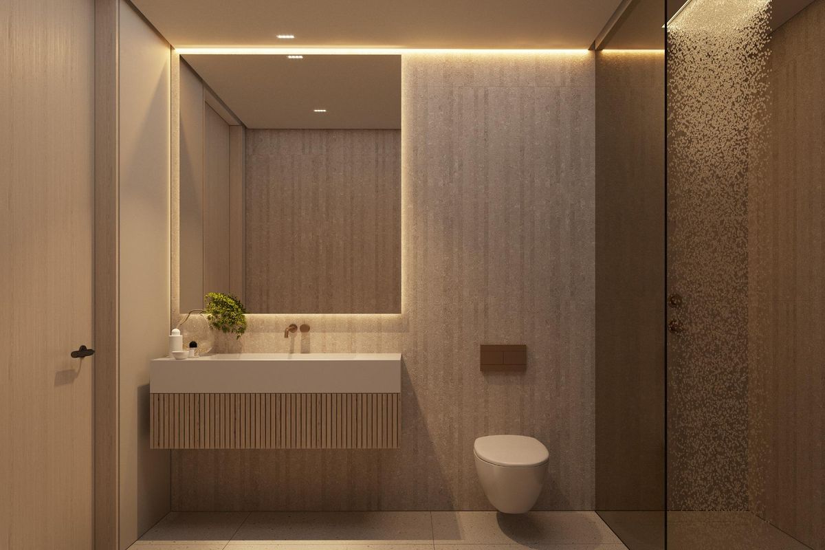 Stijlvolle badkamer met een strak wastafelmeubel en douche in een moderne villa in Marbella, Costa del Sol.