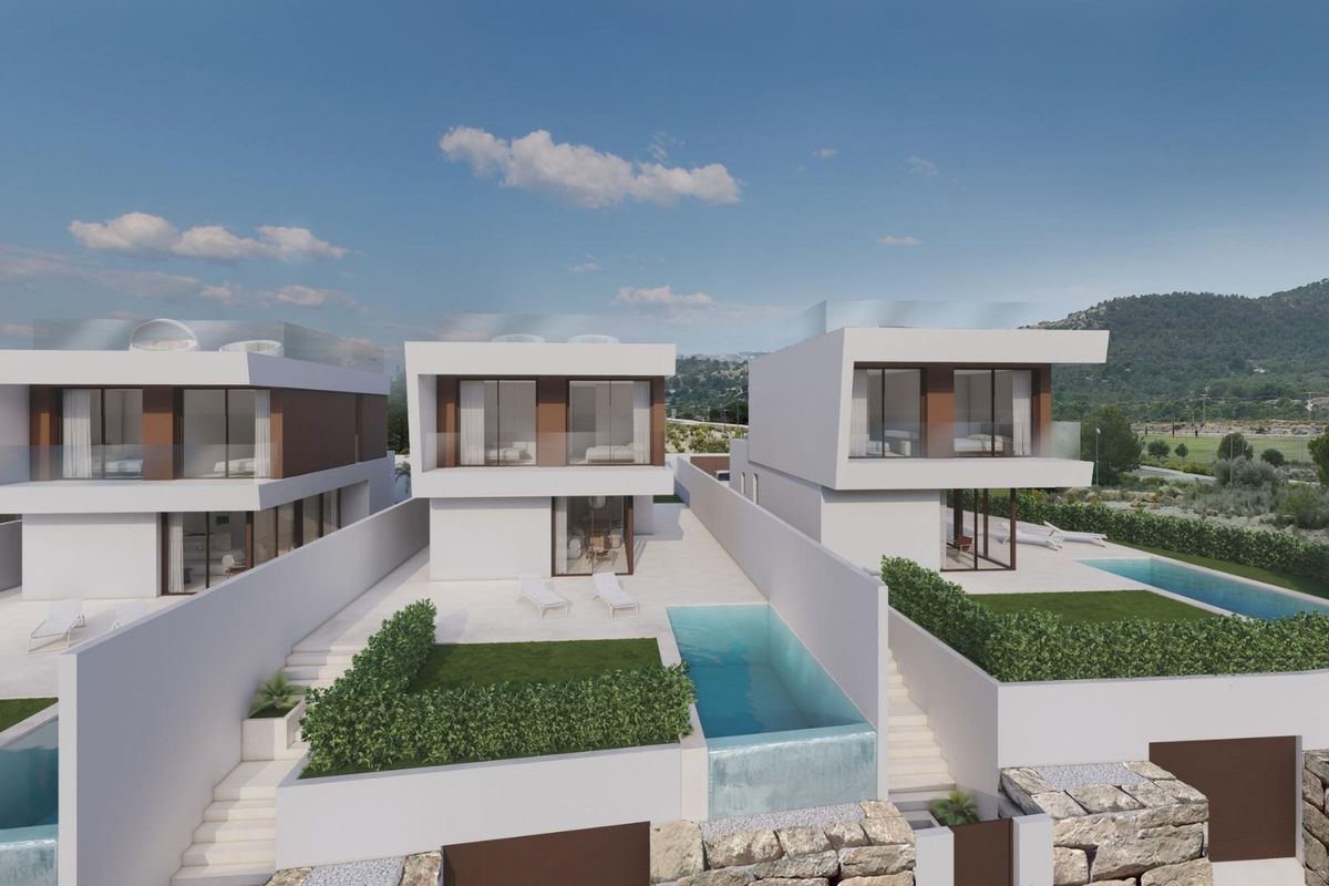 Villa's in Finestrat, costa blanca noord, die hun moderne ontwerp laten zien met privézwembaden en tuinen. Uitzicht op de bergen op de achtergrond.