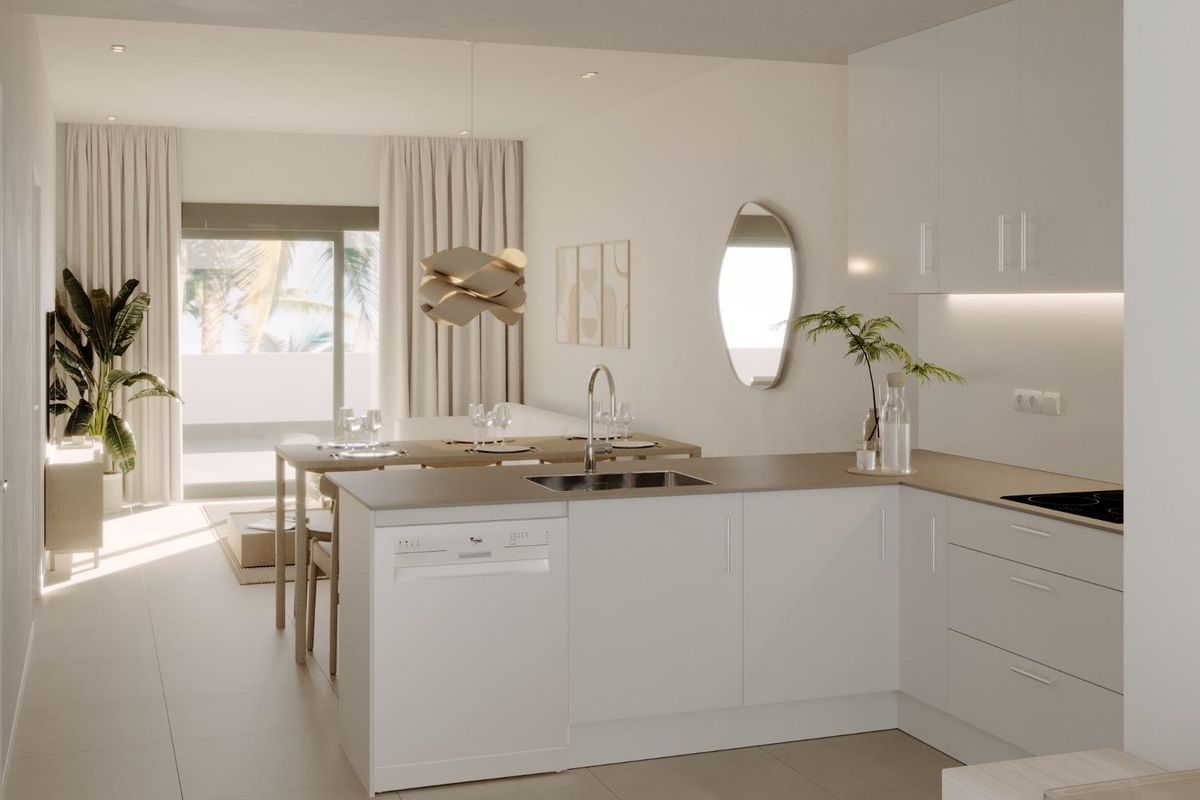 Moderne keuken in 2-slaapkamer penthouse in La Nucia met elegante decoratie en natuurlijk licht.