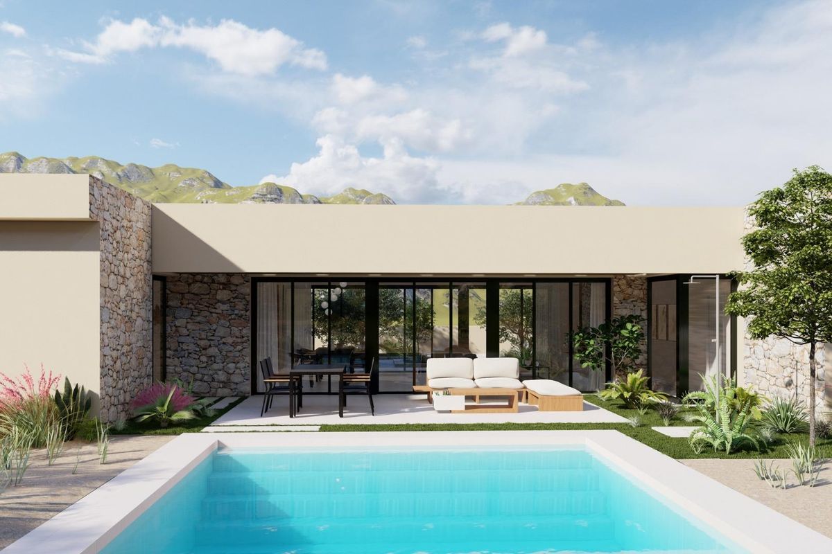 Moderne villa buitenkant met een zwembad, omringd door een weelderige tuin, gelegen in Yecla, Costa Blanca Noord.