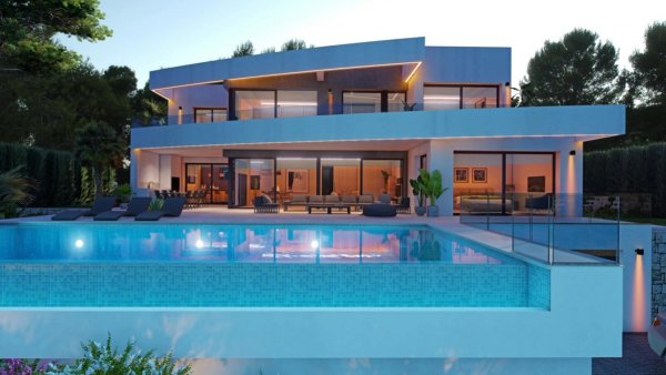 Exterior evening view of a modern 5-bed villa in Moraira, Costa Blanca North, featuring a pool, terrace, and illuminated windows.