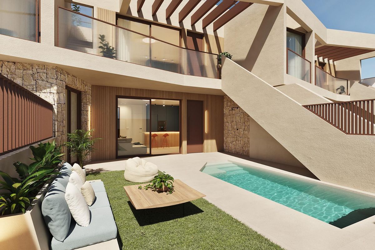 Gartenbereich des Bungalows mit Poollandschaft