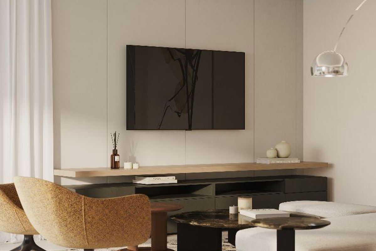 Gezellige woonkamer met moderne decoratie in een begane grond appartement in Estepona, Spanje.