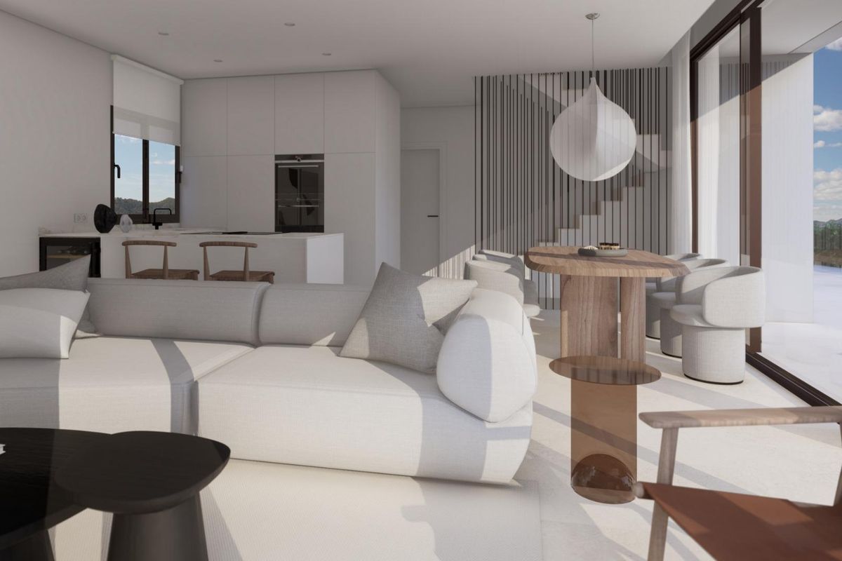 Interieur van een moderne villa met 3 slaapkamers in Finestrat, costa blanca noord, met de woonkamer, eethoek en keuken.