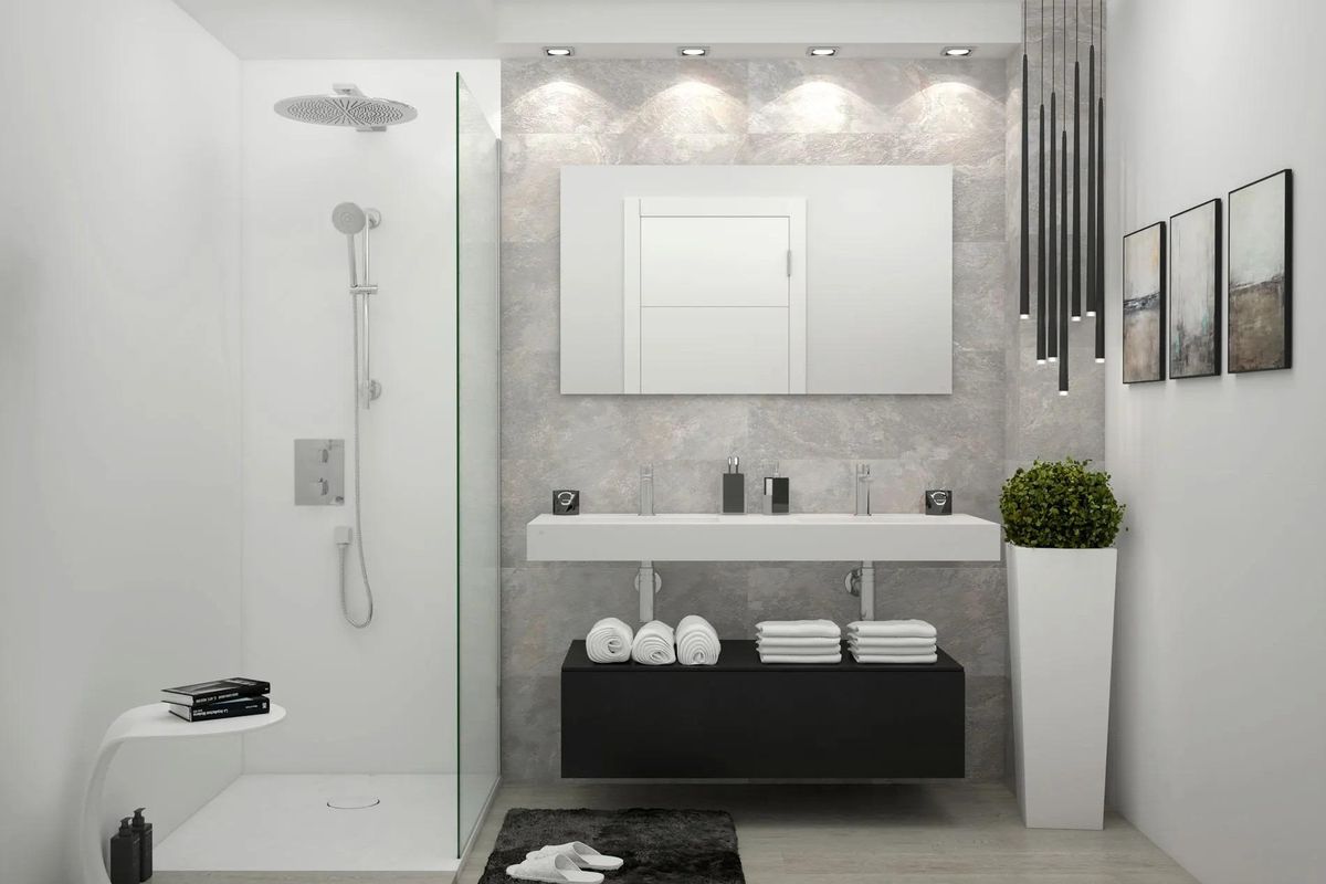 Stijlvol badkamerontwerp in een modern appartement in Mijas, Costa del Sol, met strakke armaturen.