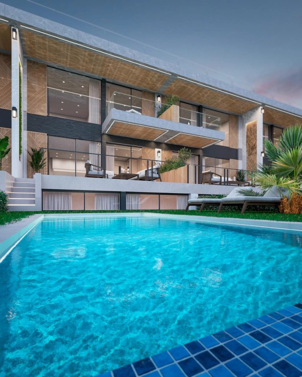 Moderne penthouse buitenkant met een zwembad en terras in Marbella, met weelderige beplanting.