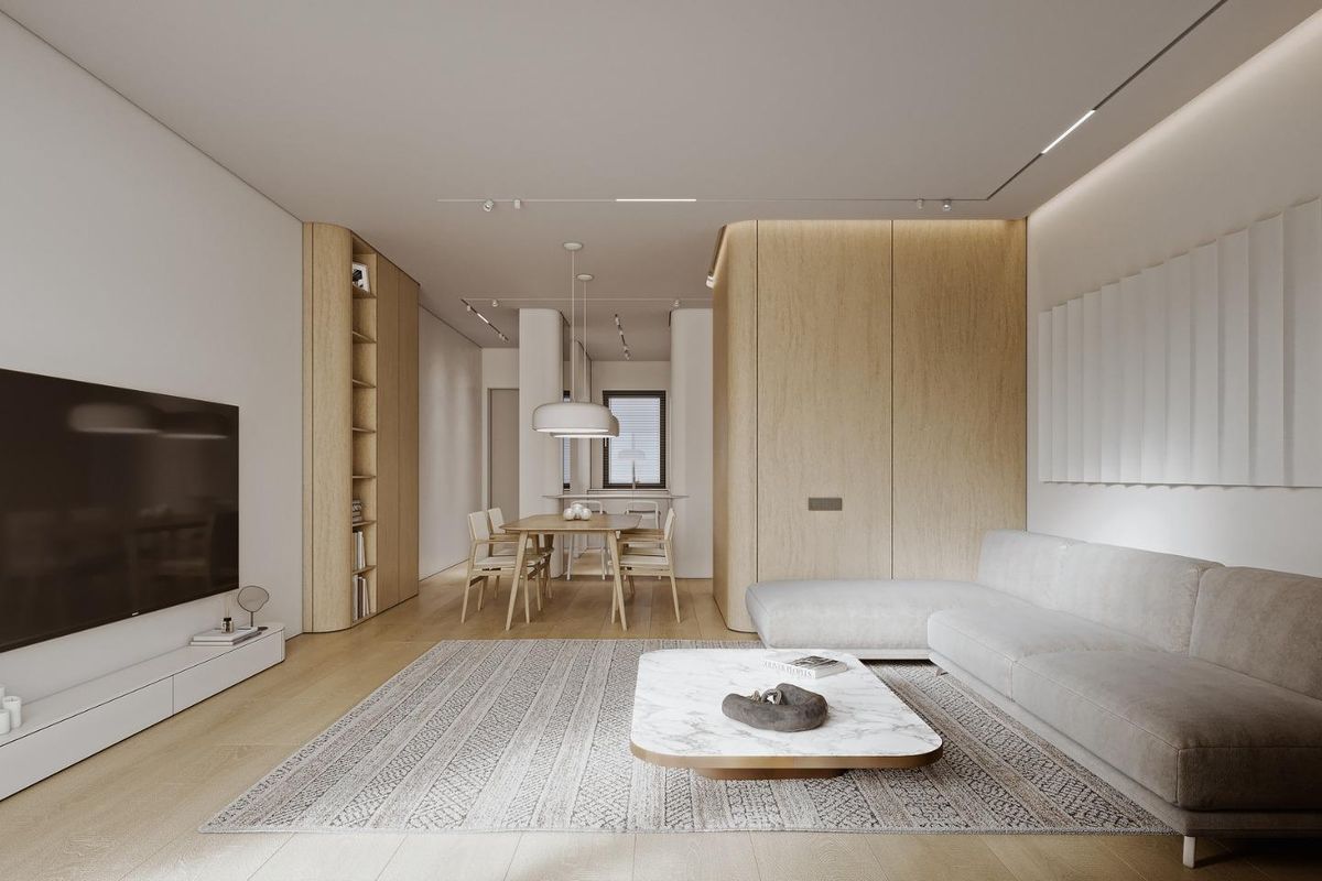 Moderne woonkamer in een 3-slaapkamer appartement in Mijas, met een gezellige ruimte in neutrale tinten.