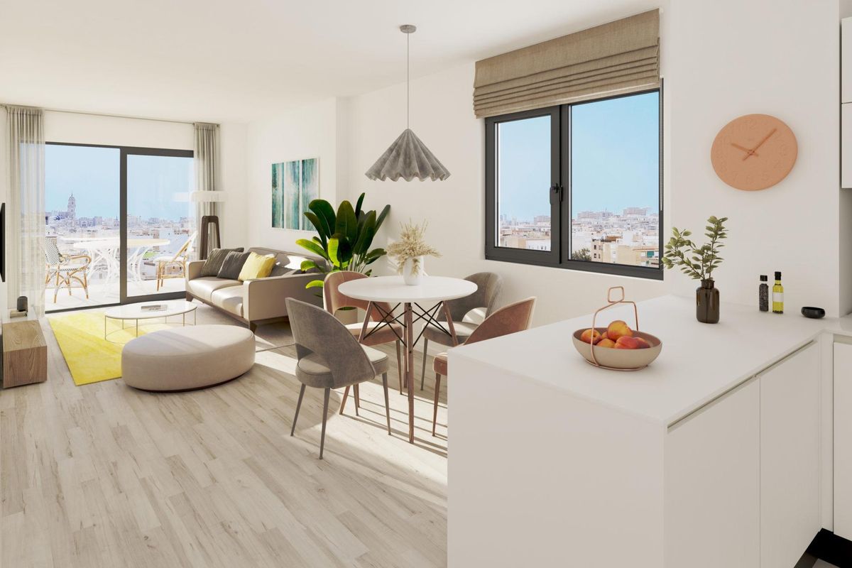 Heldere woonkamer in een 1-slaapkamer appartement in Málaga, met een open indeling en eet- en zithoeken.