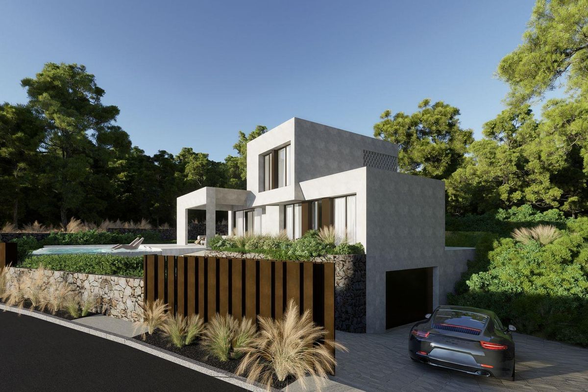 Een andere hoek van een eigentijdse villa met strakke architectuur en een ruim terras in Orihuela.
