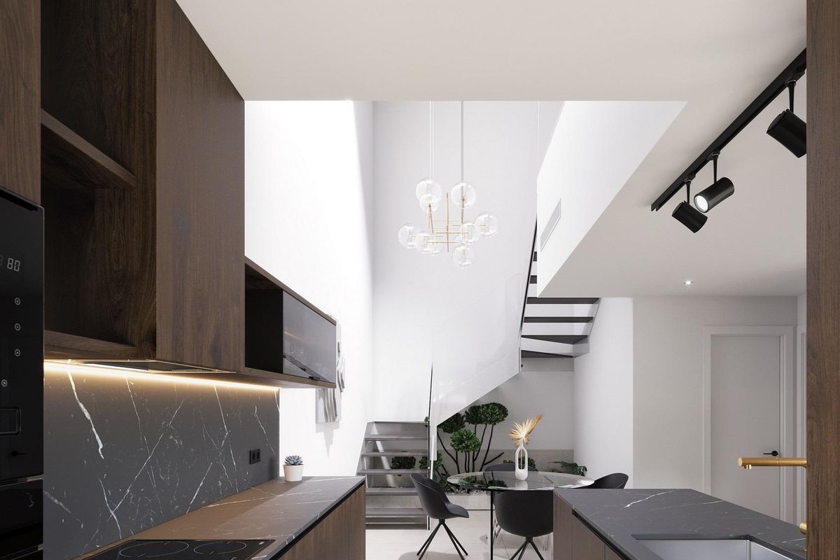 Modern keukenontwerp met elegante kasten en lichtovergoten ruimte in een townhouse in Pilar de La Horadada, Costa Blanca Zuid.