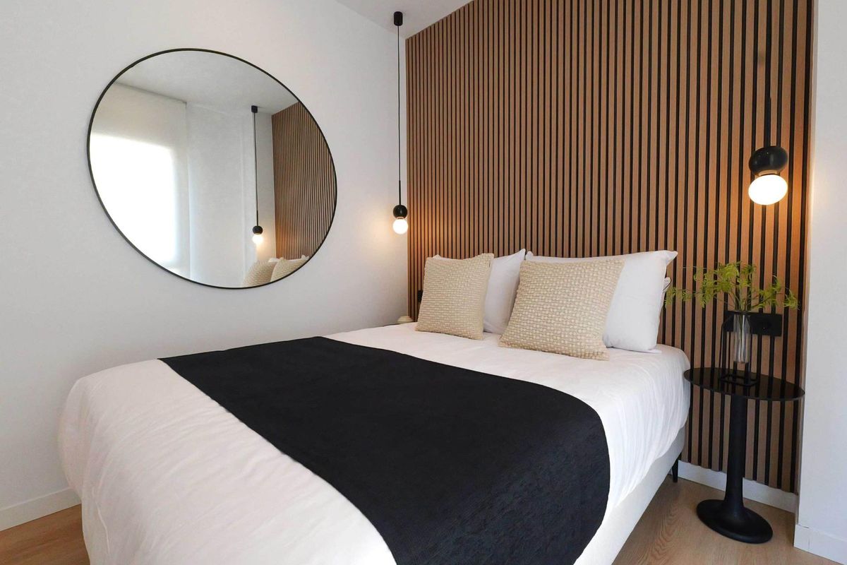 Cozy bedroom with a contemporary design and stylish accents in a 2-bed apartment, La Manga del Mar Menor.