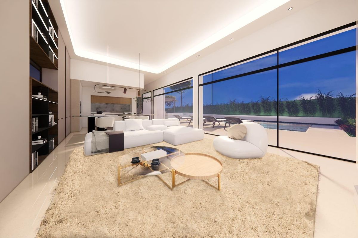 Woonkamer 's nachts met uitzicht op het zwembad, met moderne inrichting in een villa in Pilar de La Horadada.