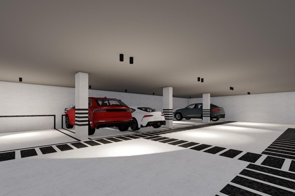 Bezetting in de ondergrondse garage van het 3-slaapkamer appartement in Guardamar del Segura, met geparkeerde voertuigen.