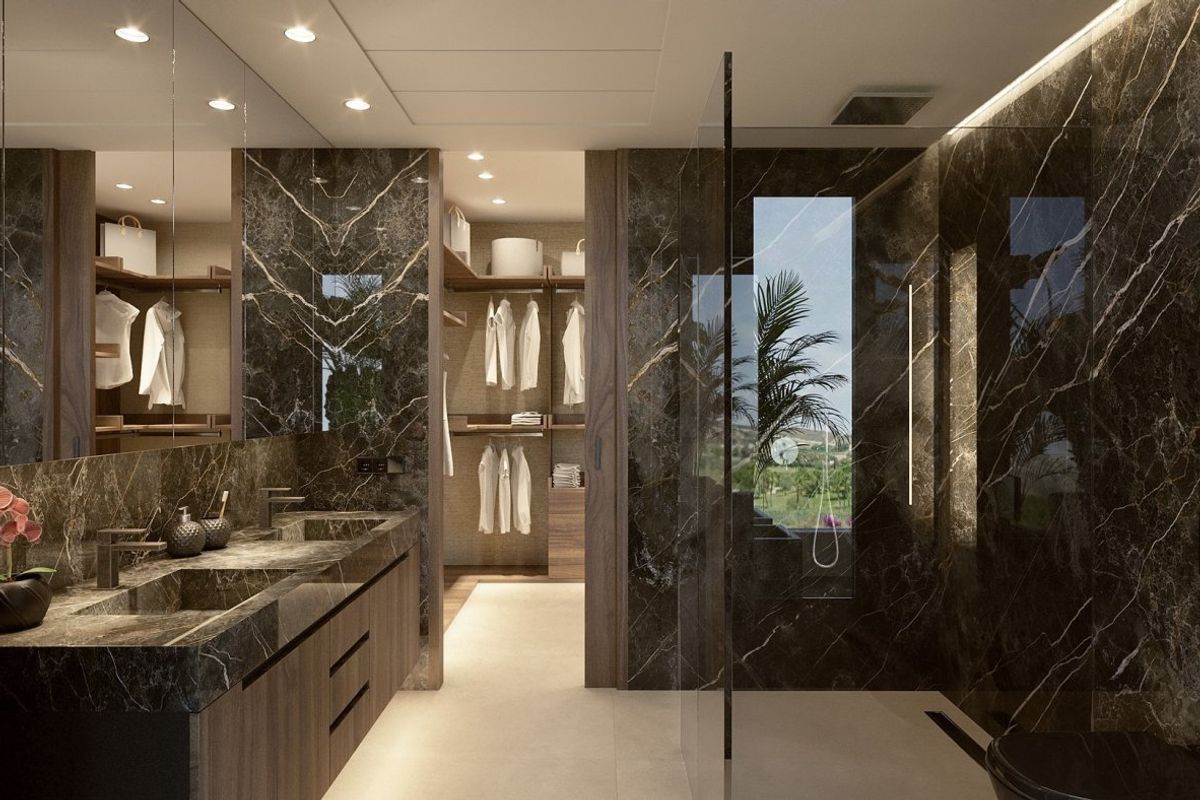 Luxueuze badkamer in de villa in Algorfa, versierd met marmeren afwerkingen en stijlvolle accessoires.