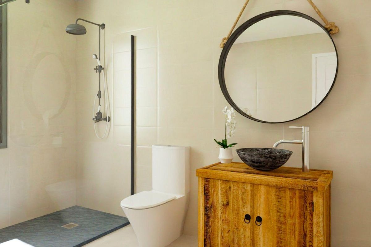 Modern bathroom in the 3-bed villa, Monforte del Cid, featuring a stylish vanity and shower area.