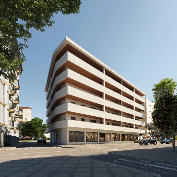 Moderne buitenkant van een nieuw gebouw met 3-slaapkamers in Fuengirola, Costa del Sol, met drie niveaus.
