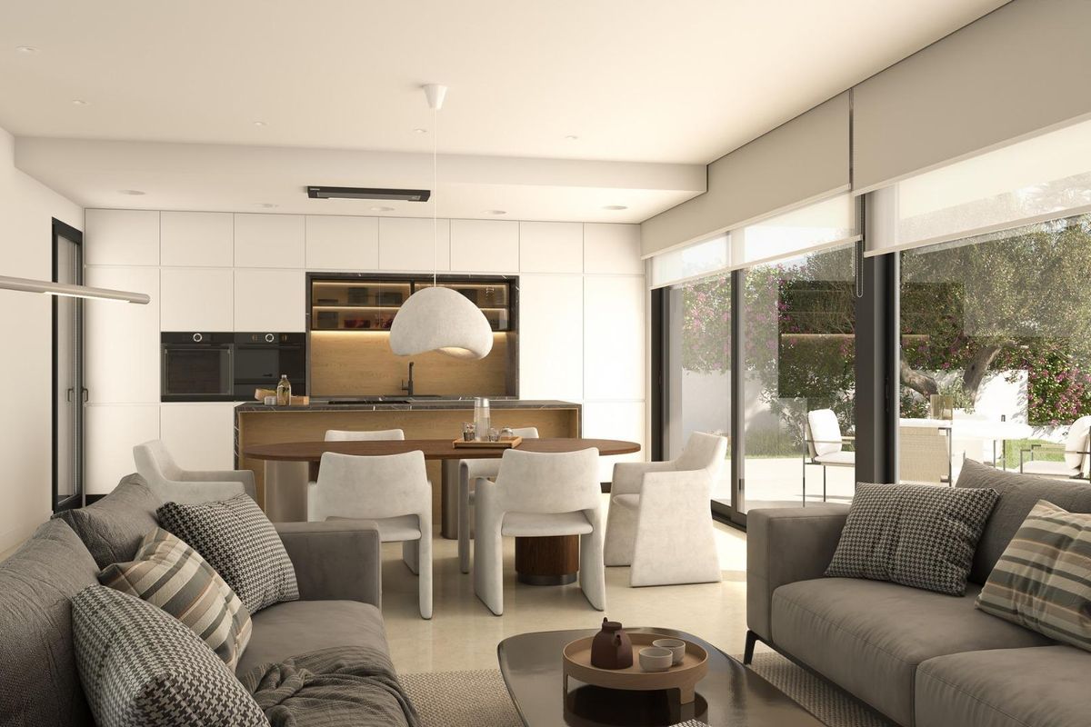 Moderne keuken en eetruimte in een 3-slaapkamer villa in Cuevas Del Almanzora, met een strak ontwerp en natuurlijk licht.
