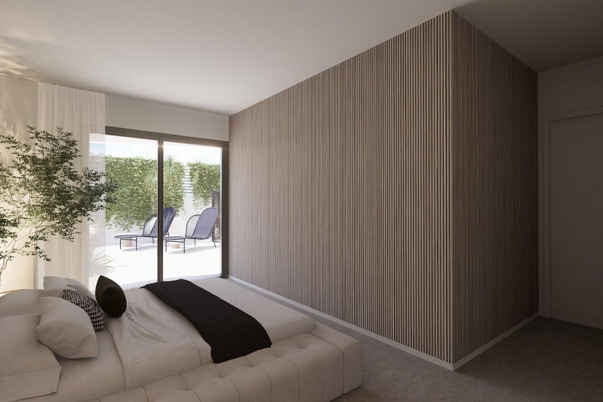 Heldere slaapkamer in een 3-slaapkamer villa, Rojales, met stijlvolle decoratie en directe toegang tot de tuin.