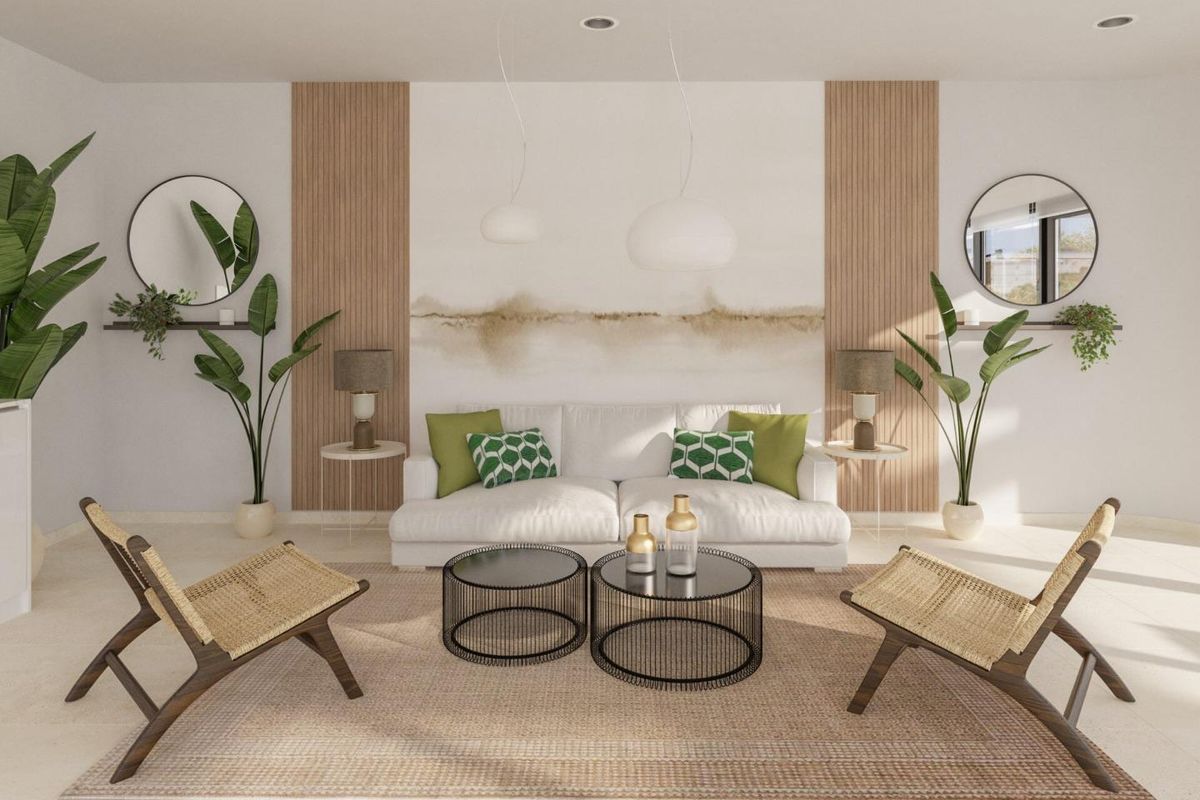 Gezellige woonkamer met eigentijdse meubels en natuurlijk licht in een appartement met 2 slaapkamers in Mijas.