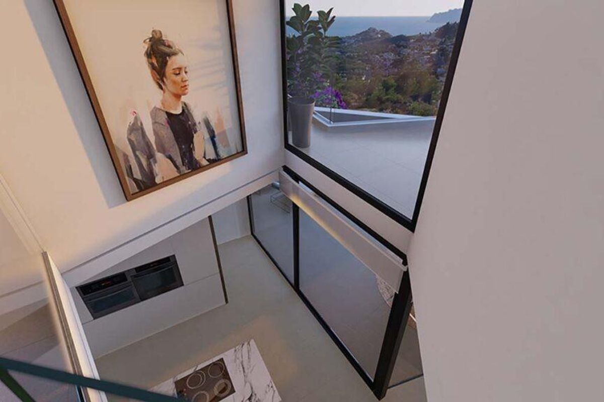 Elegant living room with large windows and sea views