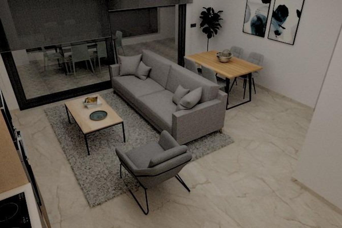 Moderne woonkamer met een gezellige bank, eethoek en moderne decor in een appartement in Pilar de La Horadada.