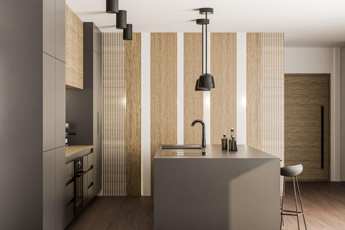 Stylish kitchen featuring sleek cabinetry and a central island, part of a 3-bedroom villa in Pinoso, Costa Blanca.