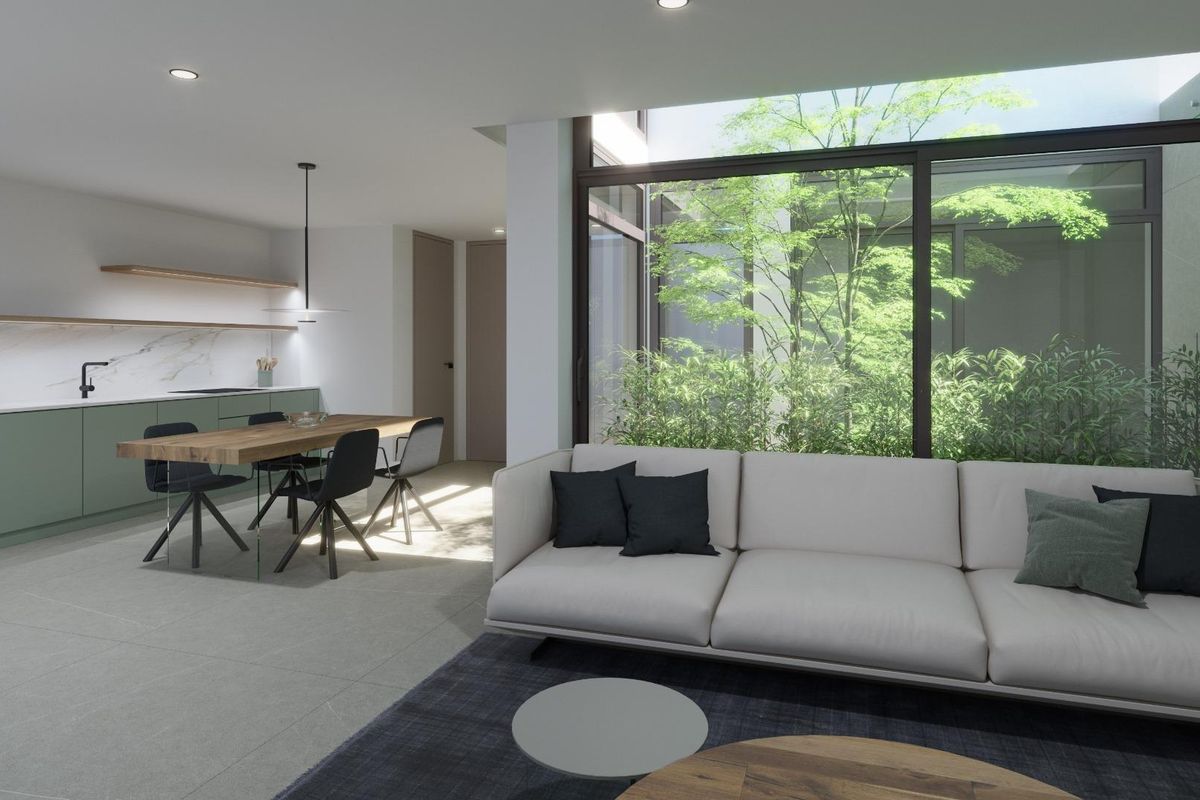 Lichte woonkamer in de villa in La Nucia, met uitzicht op een privétuin, ideaal voor ontspanning en vermaak.