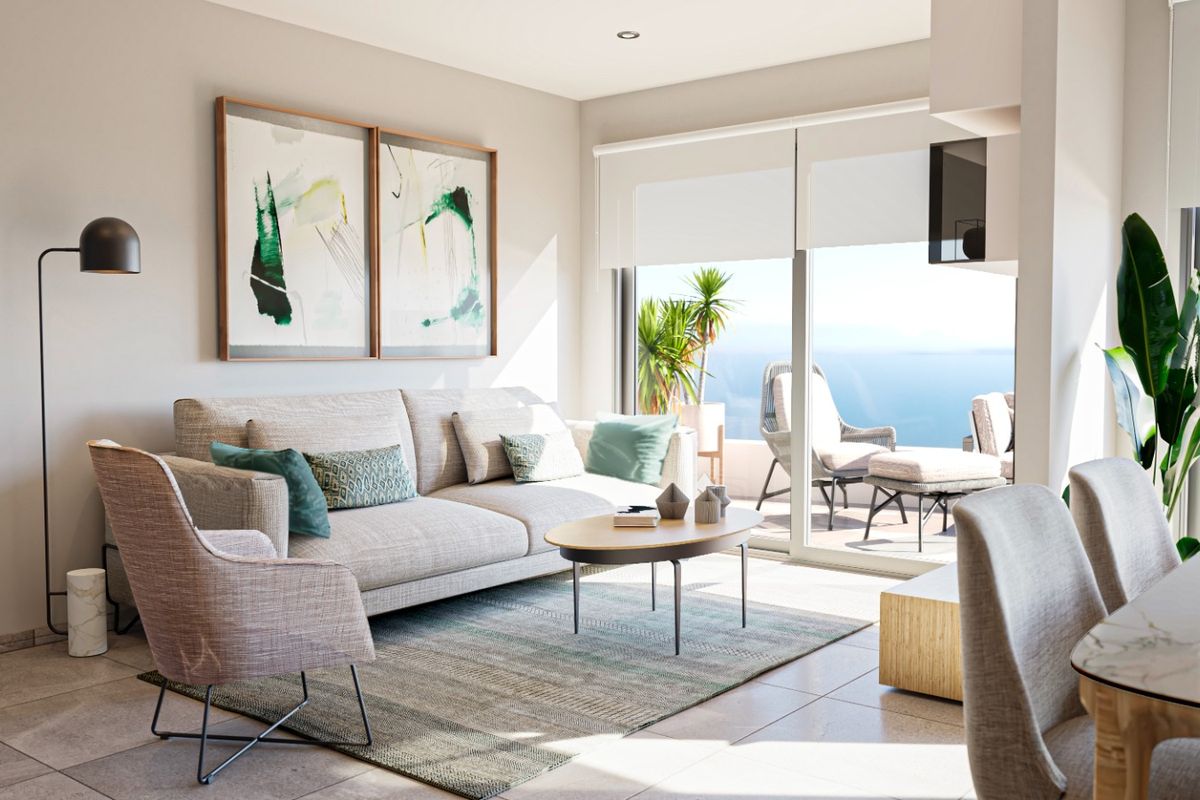 Elegante woonkamer met kunstwerken en uitzicht op het strand in een 3-slaapkamer appartement, Punta Prima, Costa Blanca Zuid.