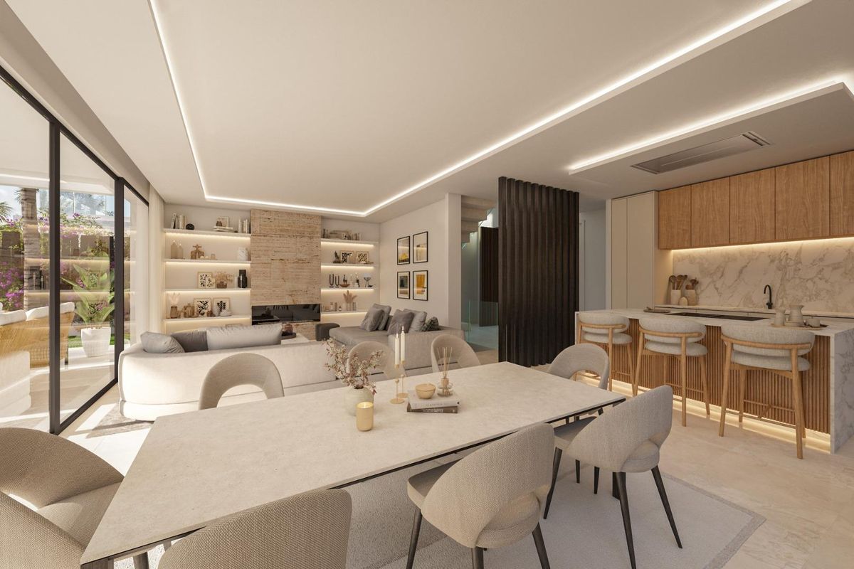 Strakke keuken en eetruimte in een moderne villa, met elegante ontwerpen in Estepona.