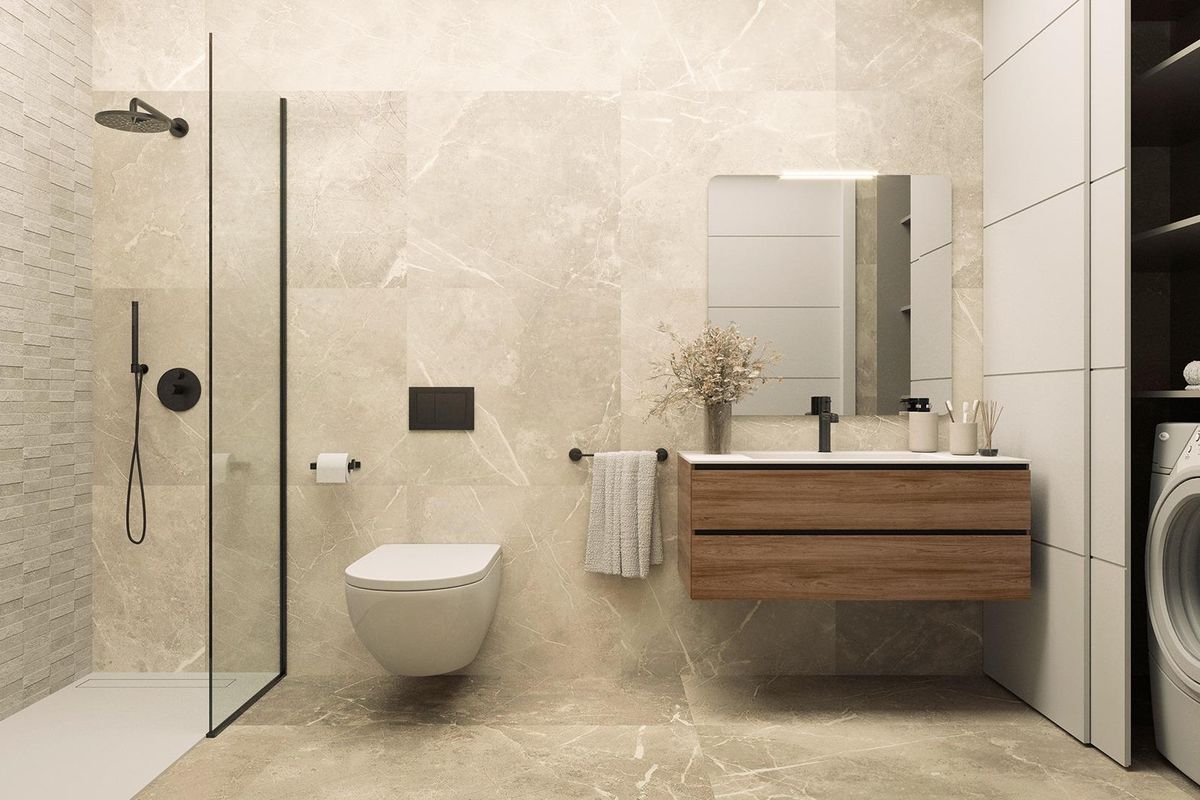 Moderne badkamer in het appartement op de begane grond in Torrevieja, met elegante armaturen en ruime indeling.