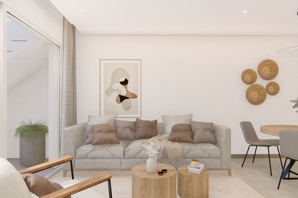 Relaxed seating area in the apartment showcasing modern furnishings, perfect for unwinding after a long day.