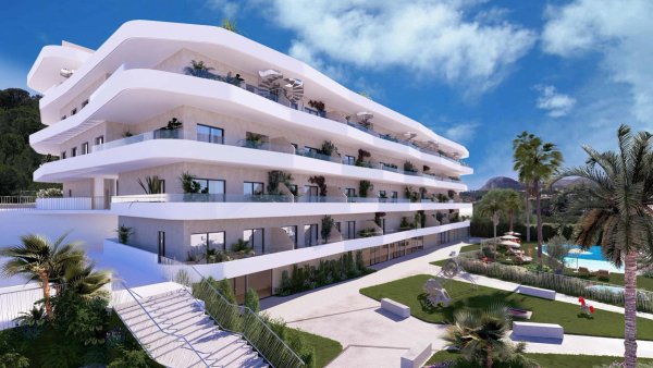 Moderne buitenaanzicht van een 2-slaapkamerappartement in La Nucia, Costa Blanca, omringd door groen.