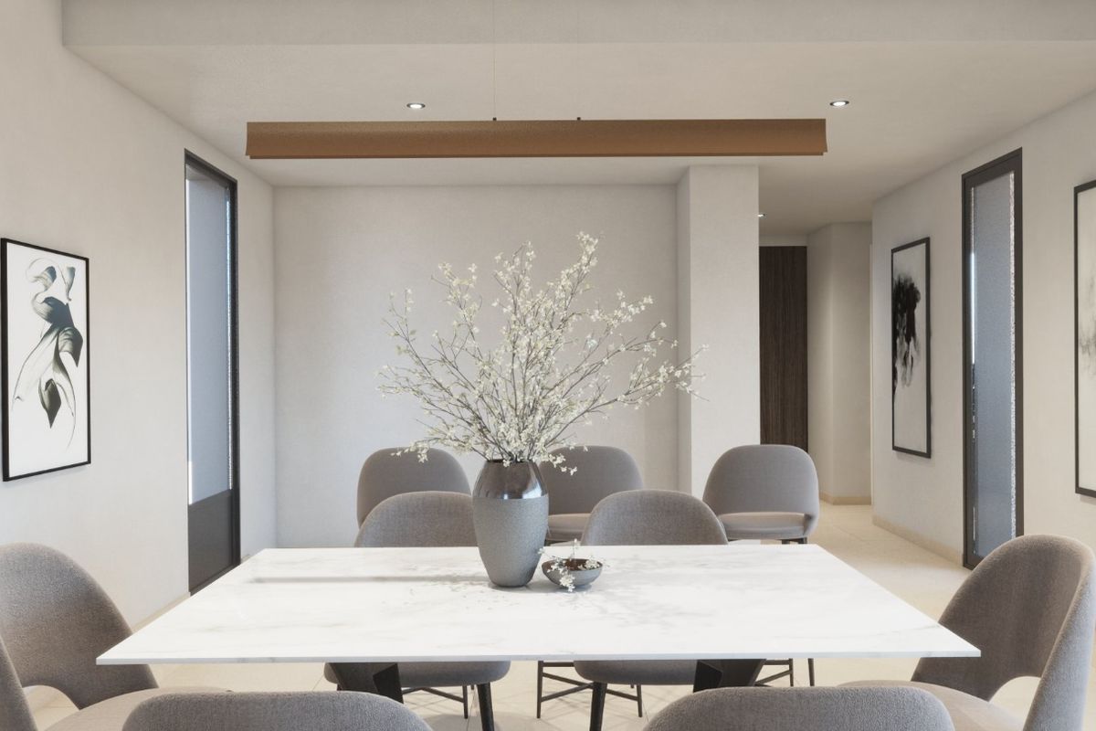 Eetruimte met een marmeren tafel in een hedendaags appartement in Torrevieja, Costa Blanca.