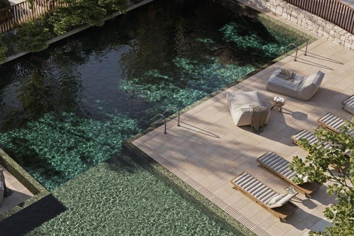 Luchtfoto van het wooncomplex in Godella, met nadruk op groene ruimtes en moderne architectuur.