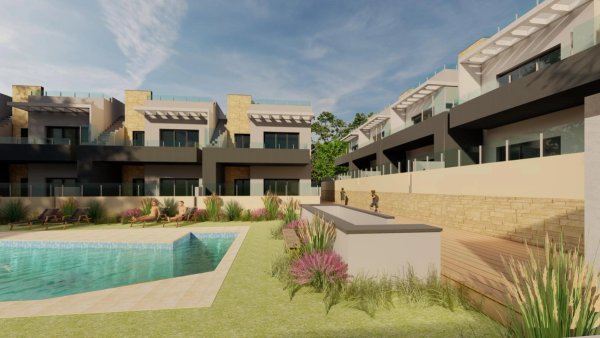 Buitenaanzicht van een modern bungalowcomplex in Bigastro, Spanje, met een zwembad en aangelegde tuin.