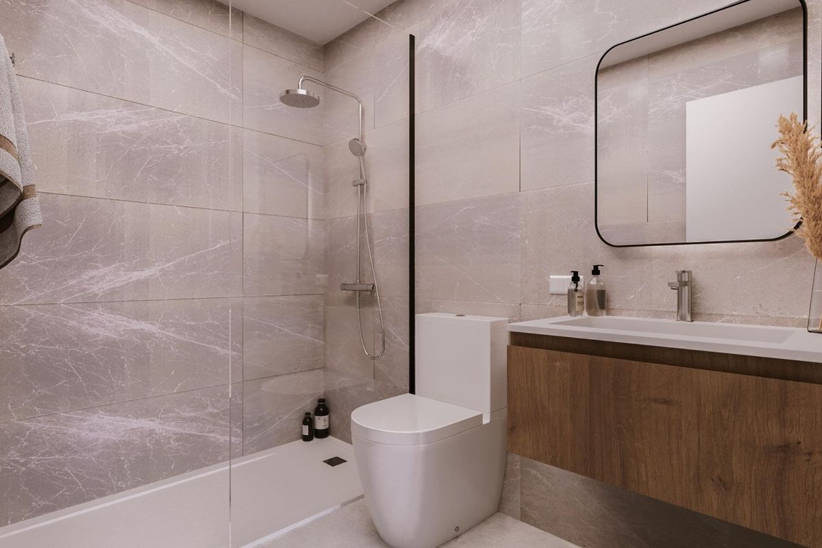 Bathroom with modern fixtures in apartment
