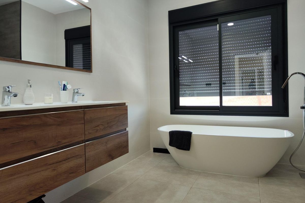 Elegant bathroom showcasing a freestanding tub and modern amenities in a villa in Pinoso, Costa Blanca South.