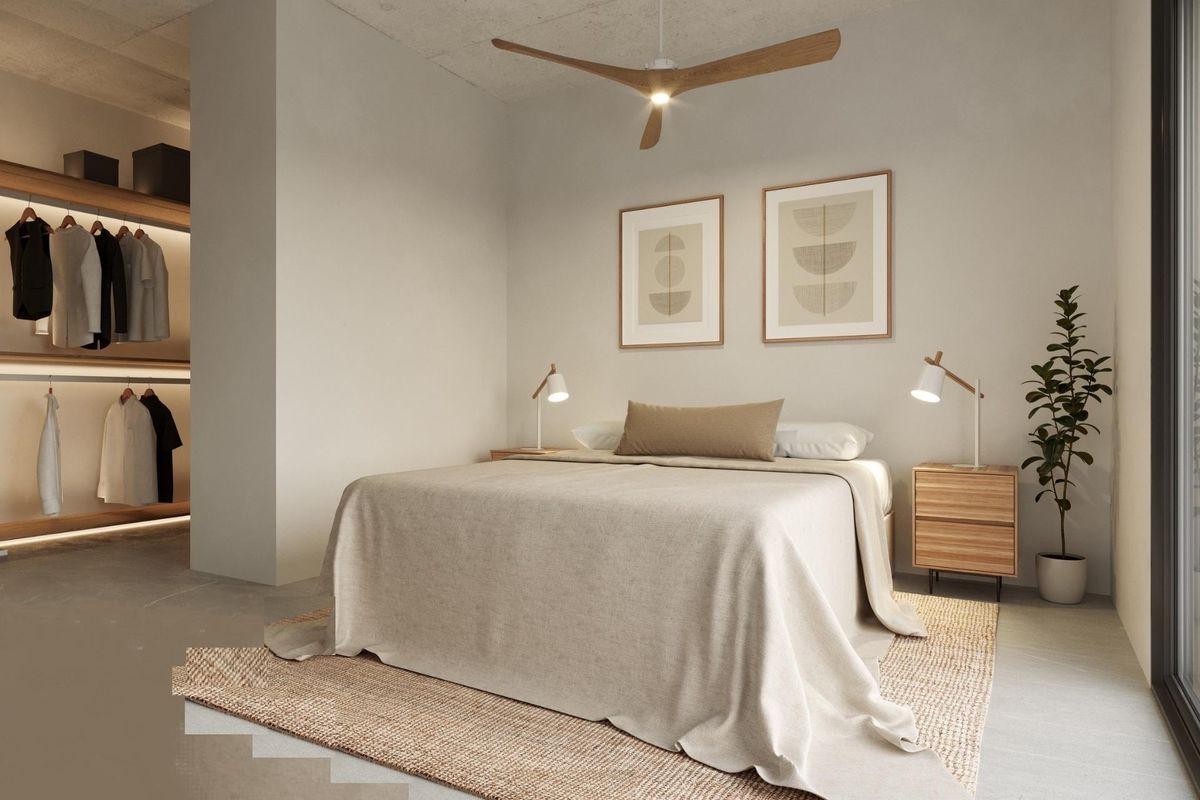 Gezellige slaapkamer in een townhouse in Polop, Costa Blanca, ontworpen met neutrale tinten en stijlvolle decoratie.