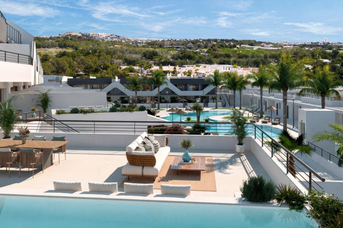Communal swimming pool with landscaped gardens