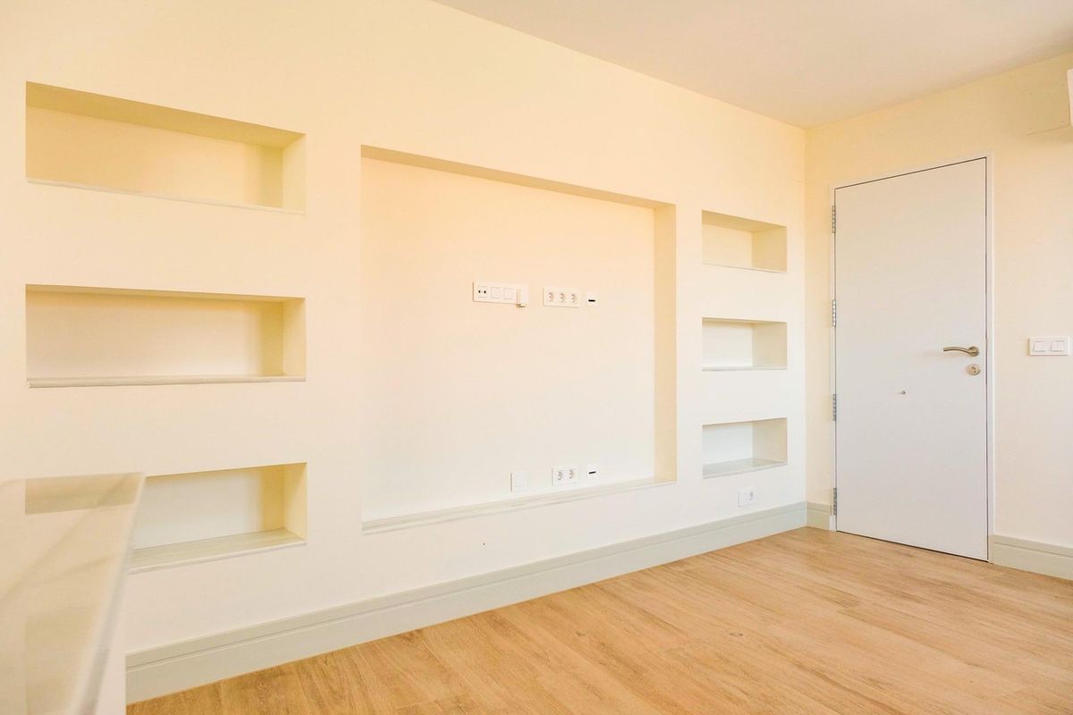 Schlafzimmer mit Zugang zur Terrasse in Málaga