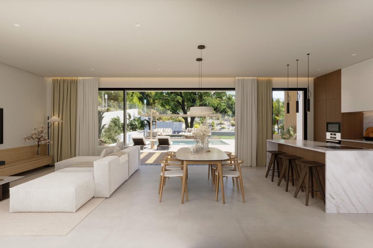 Stijlvolle woonkamer en eetruimte in de villa in Finestrat, met een ruime open indeling.