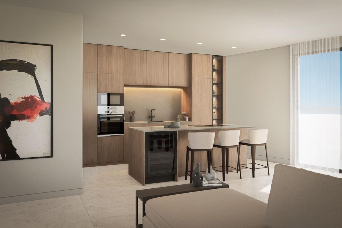 Stijlvolle keuken met moderne apparaten in een appartement in Calpe, ontworpen voor comfort en functionaliteit.